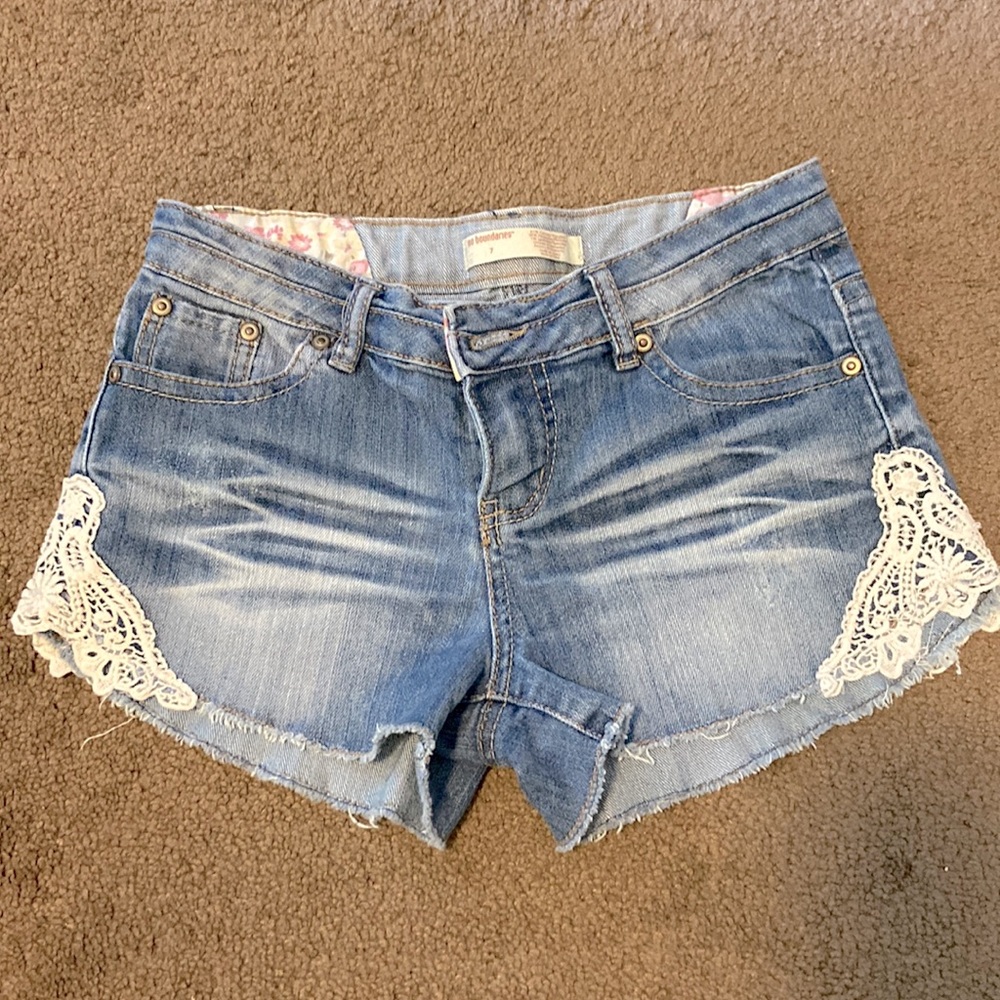 Denim shorts with lace trim